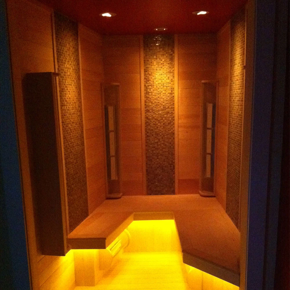 A custom built infrared sauna with under lighting