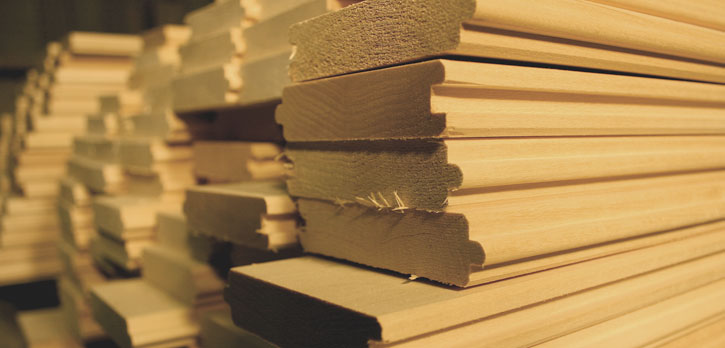 A close-up picture of a stack Canadian Basswood which is used to make SaunaRays infrared sauna