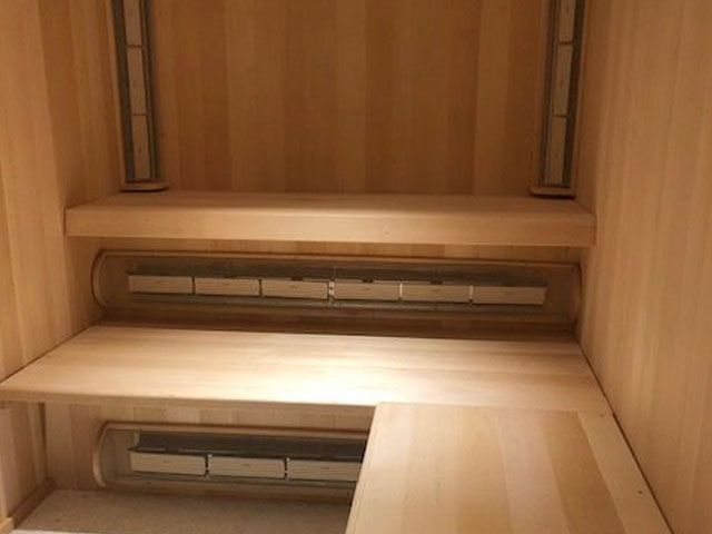 a picture looking inside of a custom sauna built by SaunaRay
