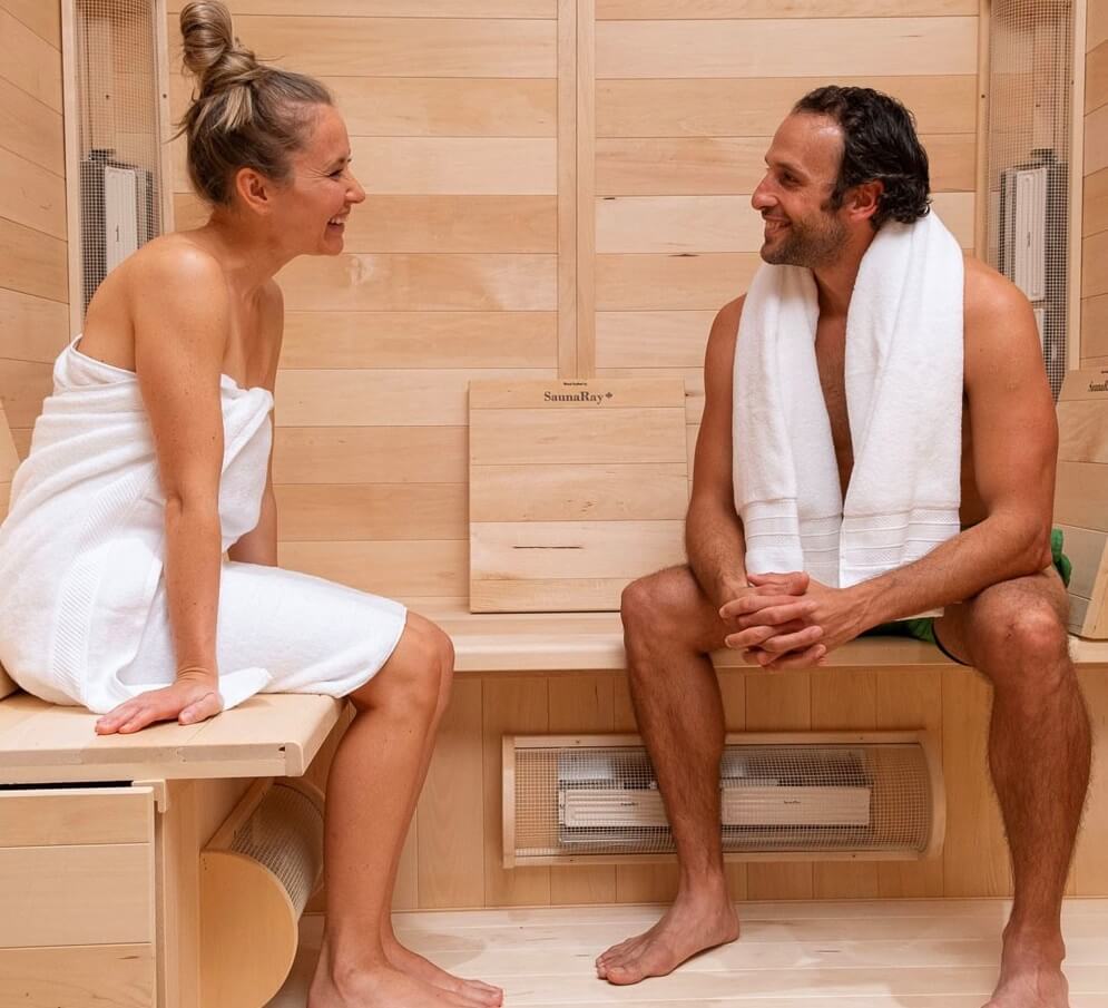 couple talking while in infrared sauna